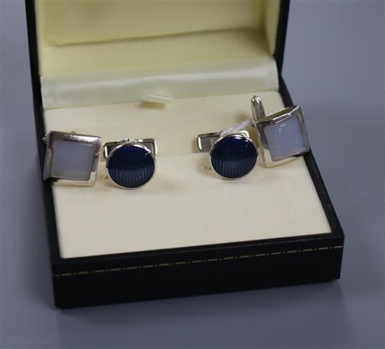 A pair of Dunhill silver and blue enamel Headlamp cufflinks and a pair of silver and mother of pearl cufflinks